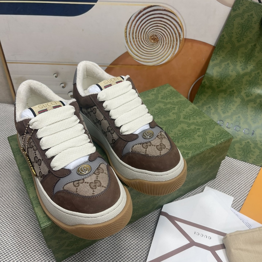 Gucci pair sneakers